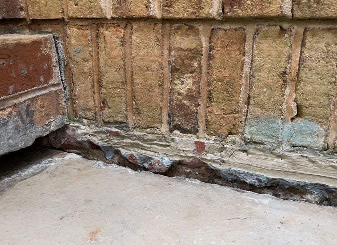 Foundation sinking away from house