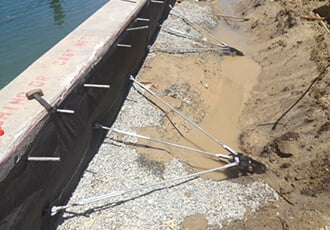 Seawall repair with Helical anchors and tiebacks
